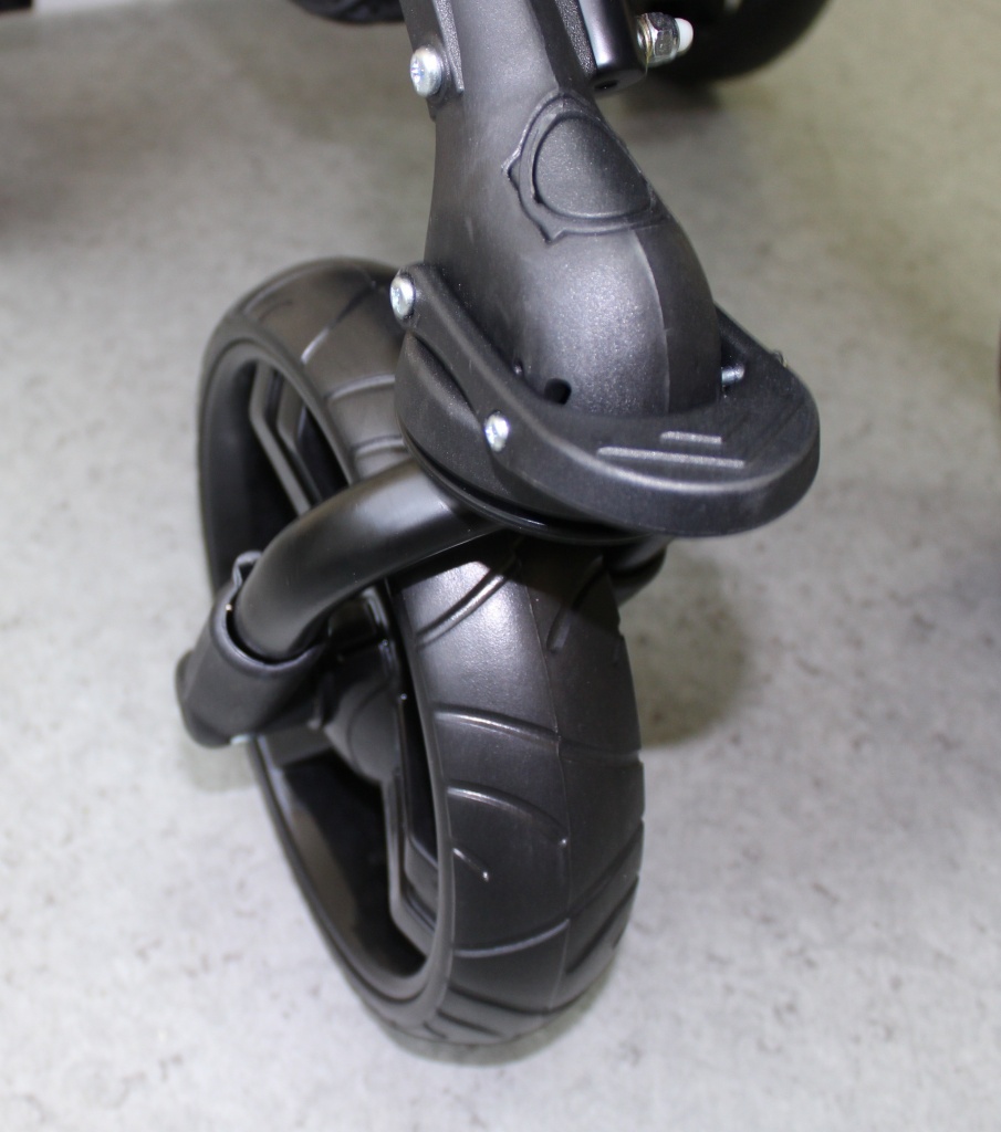 Кнопки фиксации колеса и быстрого снятия колеса коляски ST.jpg